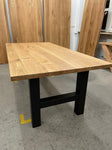 Tisch mit Massivholzplatte Eiche und Metall Tischgestelle im H-Design